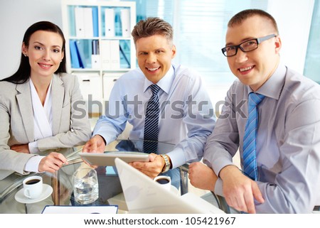 Portrait of a smiling business team embodying strong team spirit and solidarity