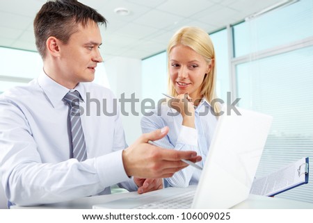 Attractive young woman meeting with an experienced businessman for a training