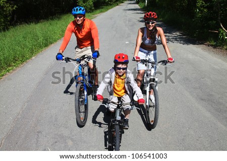 Three cyclists participating in a ride to form stamina and keep fit
