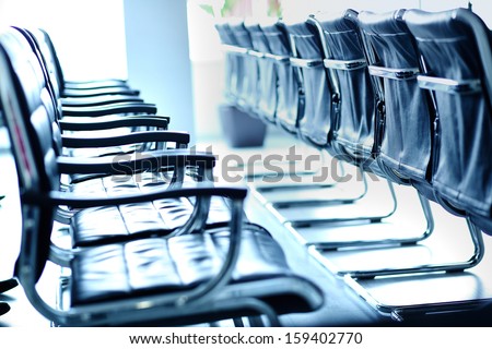 Rows of chairs in conference hall