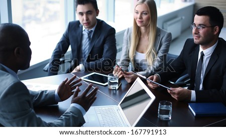 Image Of Business People Interacting At Meeting