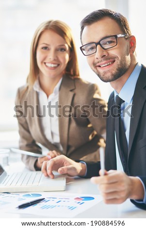 Image of two successful business partners at meeting