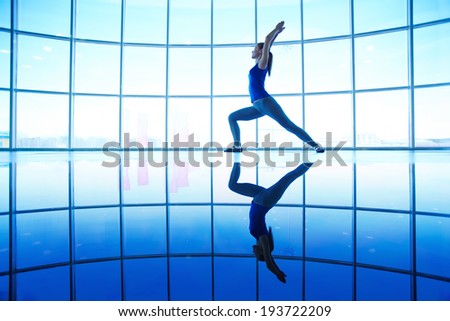 Image of female doing physical exercise for stretching
