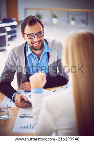 Handsome manager recruiting new workers in office