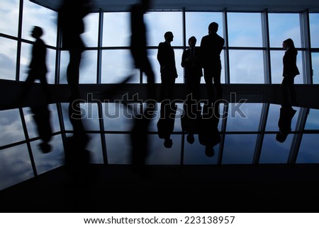 Outlines of business people, meeting, communicating and walking in office lobby