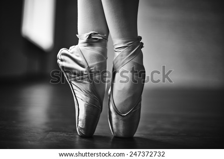 Feet of dancing ballerina during rehearsal