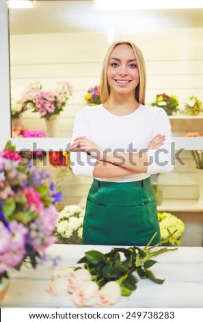 Fresh flower seller looking at camera with smile