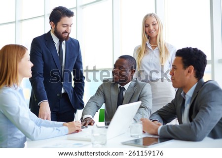 Group of business people gathering and communicating