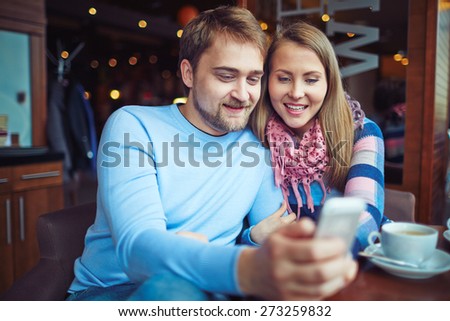 Romantic couple enjoying time in cafe