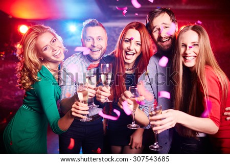 Friends partying at nightclub