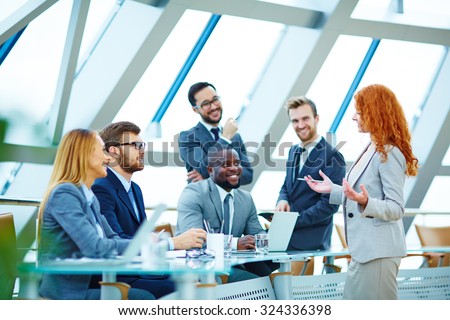 Modern employees voicing their opinions upon new ideas