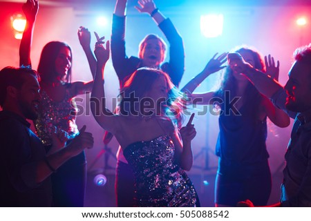 Group of friends dancing