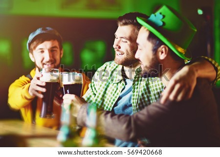 Group of Friends Celebrating at Irish Pub
