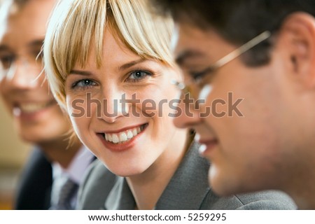 Portrait of attractive young business woman with charming confident smile