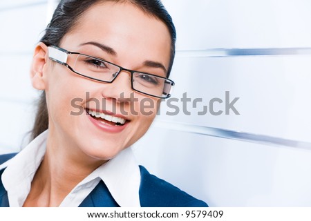 Face of business woman with smile isolated on a white background