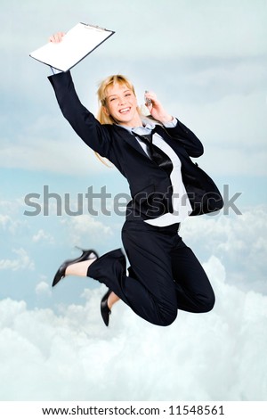 Vertical photo of very happy woman in high jump with documents and cell in hands up in the clouds