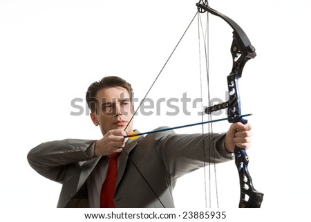 stock photo Portrait of concentrated male with crossbow in hands over