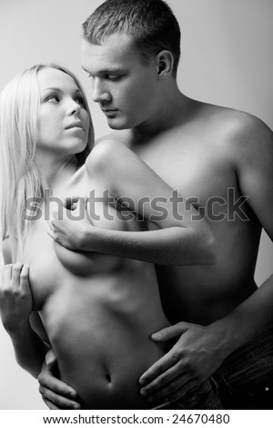 stock photo Black and white portrait of naked couple during foreplay