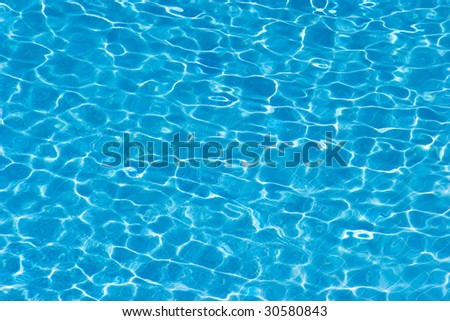 Close-up of transparent azure swimming pool with clean water