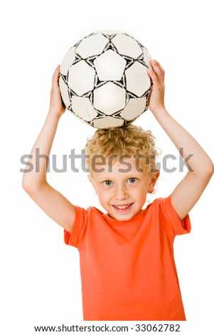 Image of sport boy holding ball over head