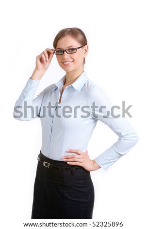 Portrait of elegant businesswoman in eyeglasses looking at camera