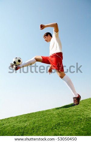 soccer player kicking ball. soccer player kicking ball
