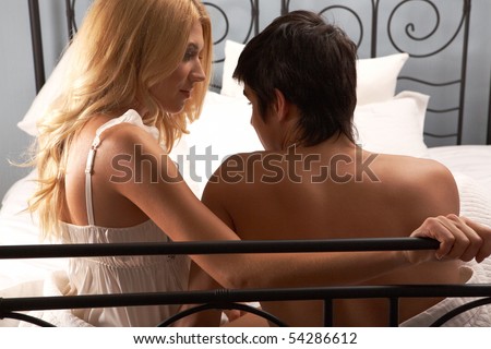 Photo of pretty woman looking at her husband while chatting
