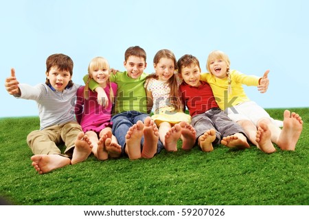 Happy Children Sitting On Green Grass Stock Photo 59207026 : Shutterstock