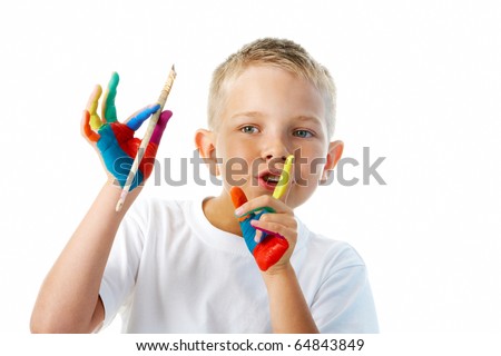 stock photo Image of preschooler with painted hands showing shhh gesture 