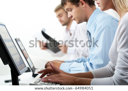 Image of female typing on keyboard in working environment