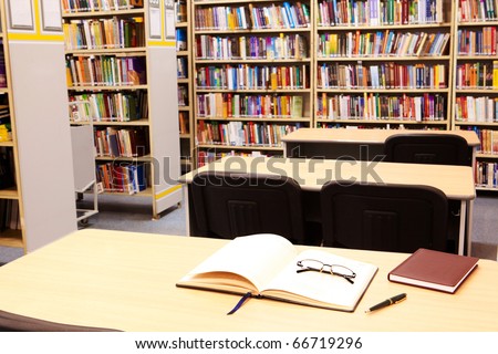 Photo of workplace in modern library of college or other educational institution