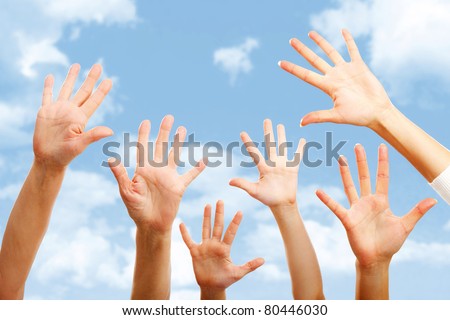 Image of hands raising isolated on blue background