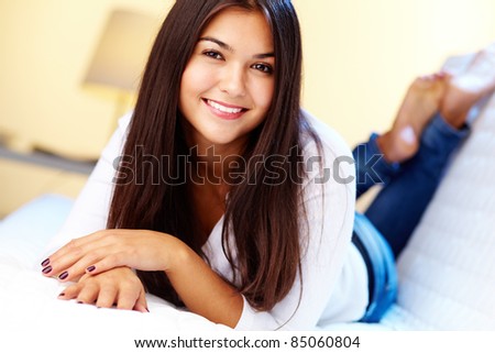 Image of pretty girl having rest at home