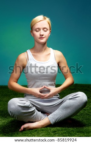 Portrait of a young meditating woman