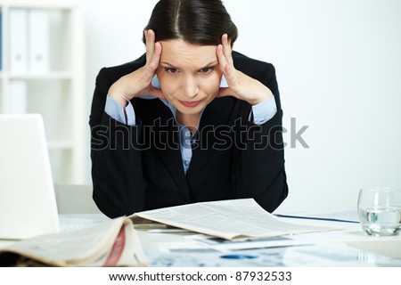 Portrait of stressed office worker in trouble