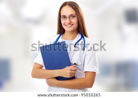 Creative image of confident female doctor looking at camera