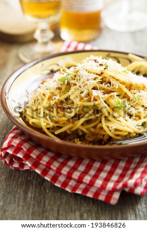 Pasta with garlic bread crumbs and tomatoes