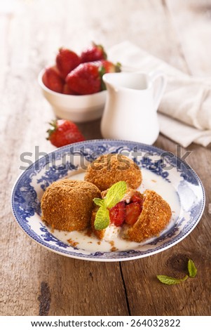 Cottage cheese balls, stuffed with strawberry