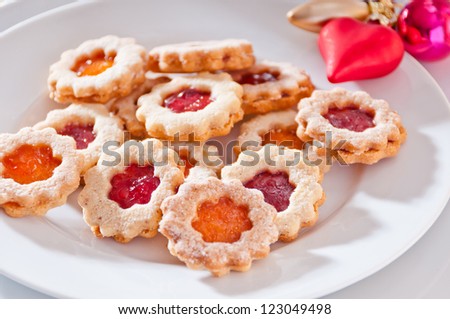 Biscuits filled with jam and powdered with sugar