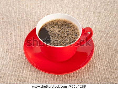 Black coffee in a red coffee cup