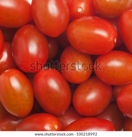 closeup macro shot of a cluster of small grape tomatoes