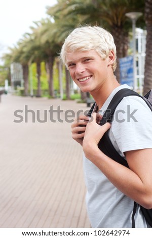 portrait of a young teenage college student on campus
