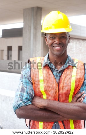 portrait of an African American construction worker on location
