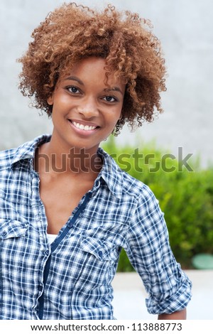 pretty african american college student on campus