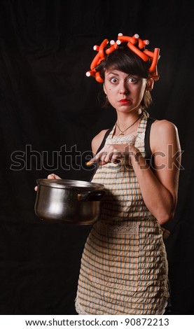 thinking housewife with a pan