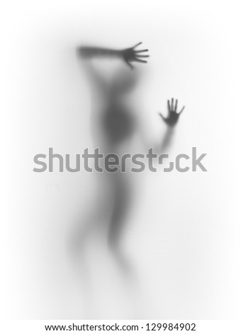 Diffuse silhouette of a dancing woman body
