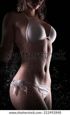 Sexy woman wet body and white bikini