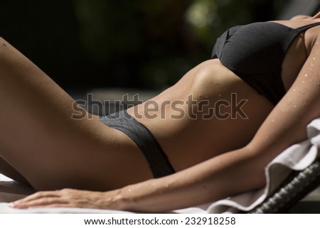 Beautiful and sexy woman body parts in swimsuit