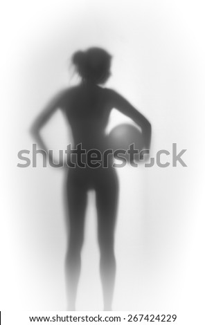 Slim female body silhouette with ball