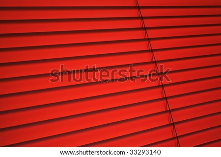 Red plastic venetian blind